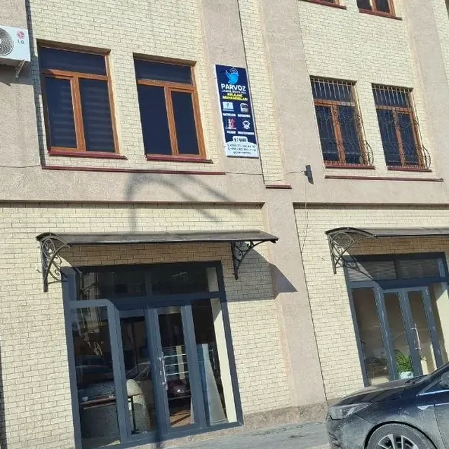 Parvoz Learning Center building and entrance, Samarkand